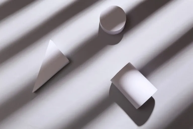 Minimal geometric solids casting long striped shadows