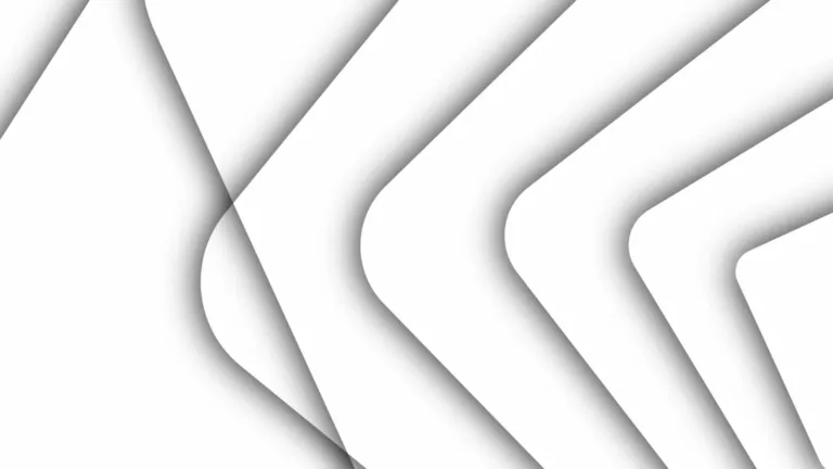 Layered white forms casting soft overlapping shadows