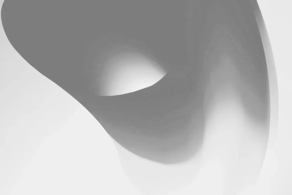 A single elegant black curve against a pale ground