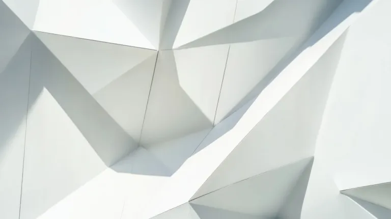 Faceted white architectural form in soft daylight