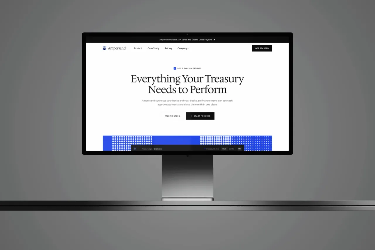 The Ampersand homepage, Everything Your Treasury Needs to Perform, on a Studio Display against a grey wall