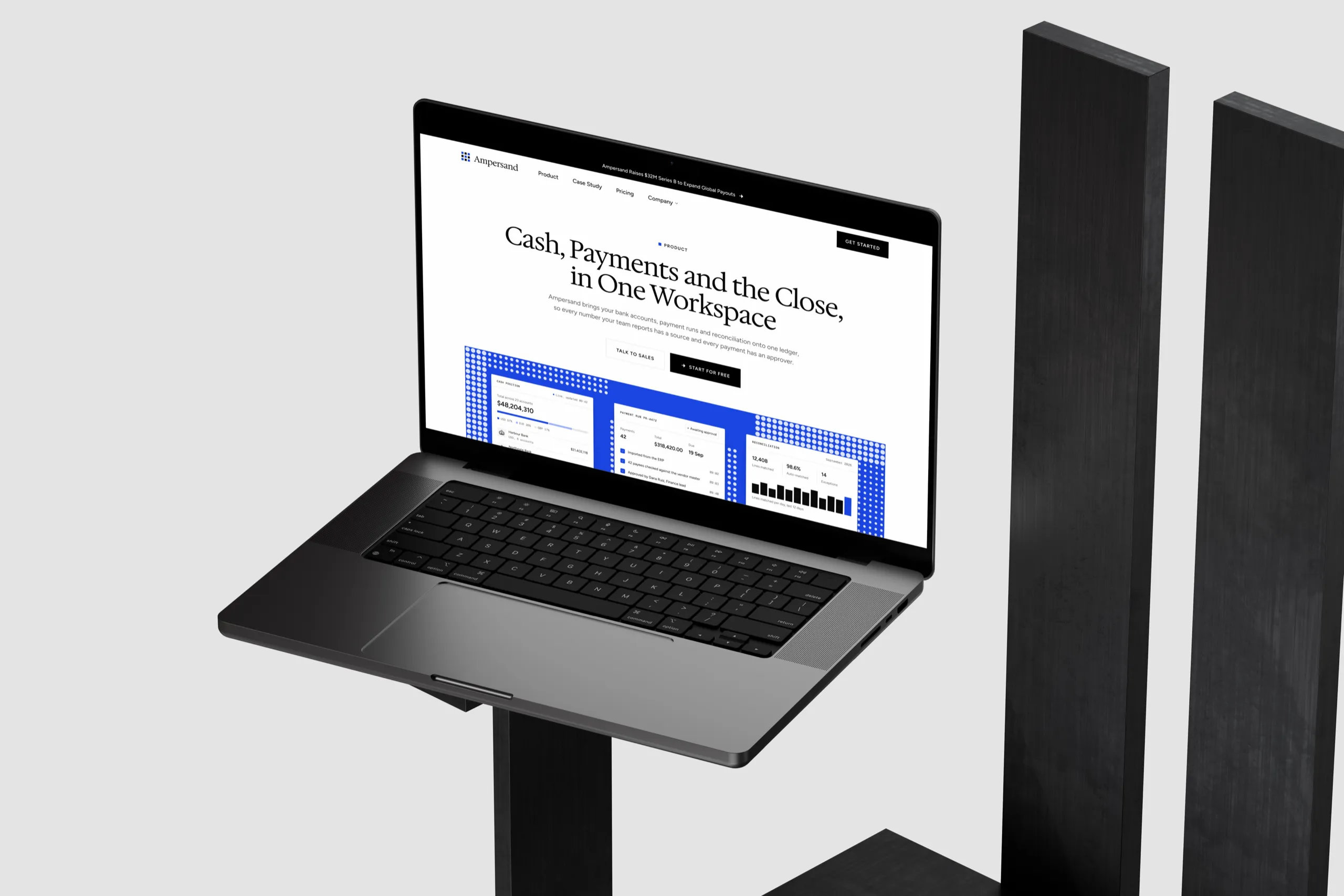 The Ampersand product page, Cash, Payments and the Close in One Workspace, on a MacBook Pro on a black stand