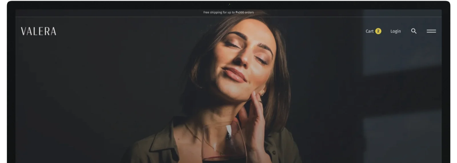 The Valera wine shop homepage on an Apple Studio Display