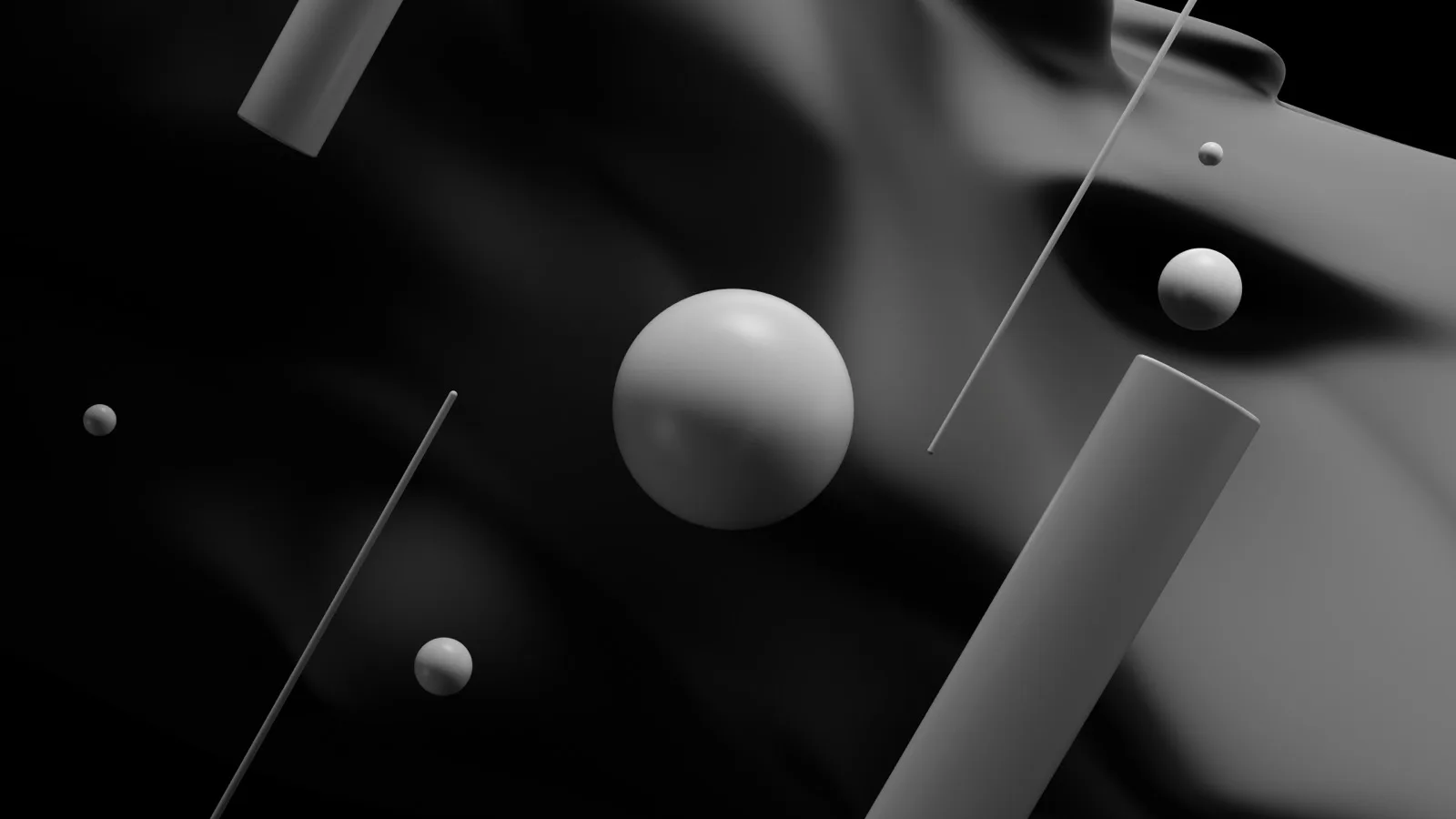 Monochrome spheres and cylinders in front of wavy geometry