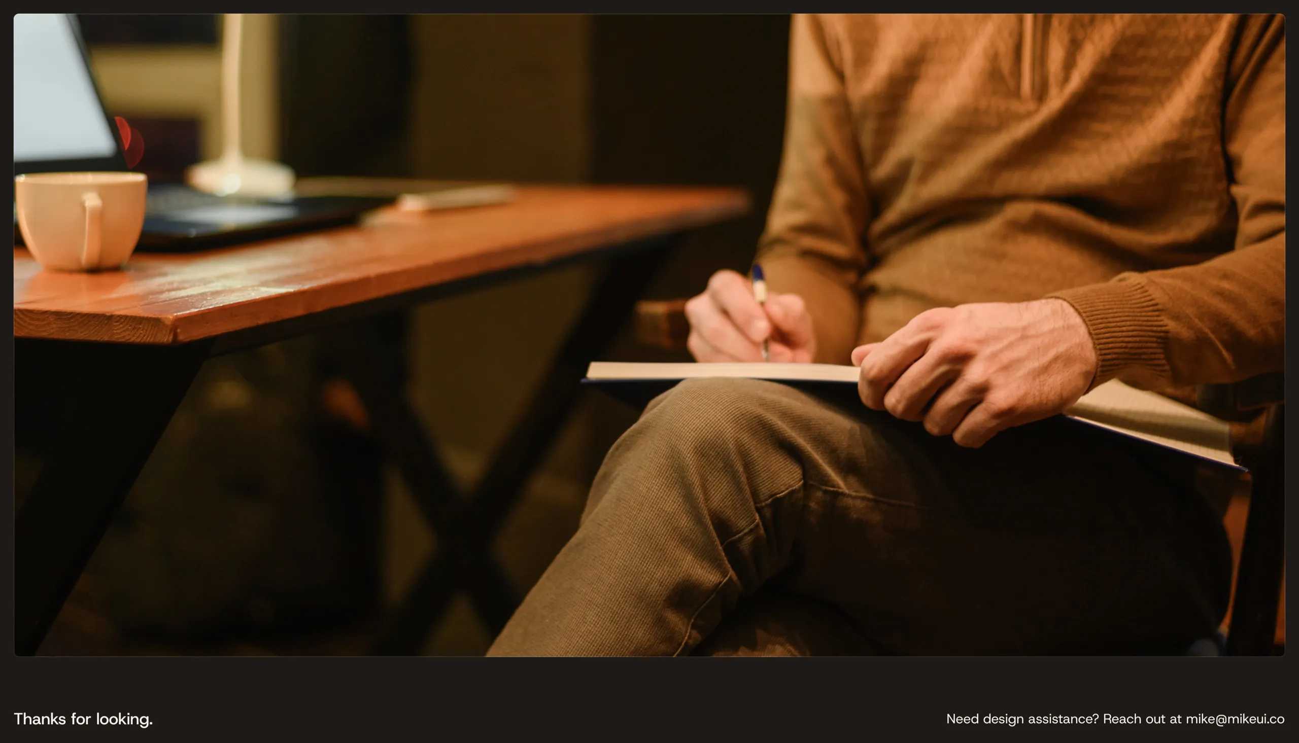 Someone writing in a notebook beside a cup of coffee, closing the case study with Mike's contact email