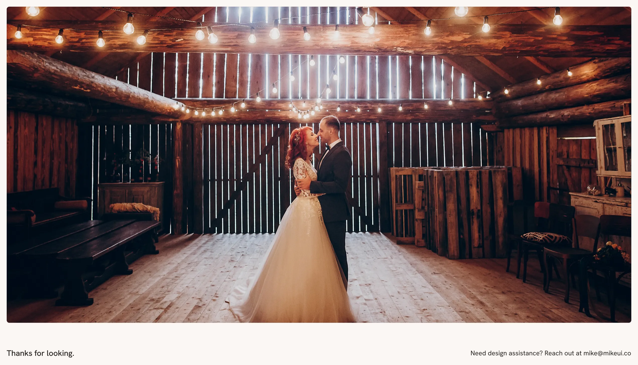 A couple's first dance in a barn under string lights, closing the case study with Mike's contact email
