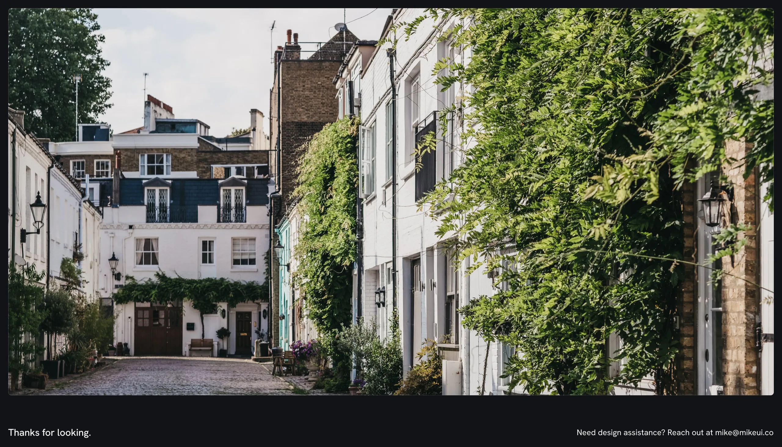 A London mews of white houses under wisteria, closing the case study with Mike's contact email