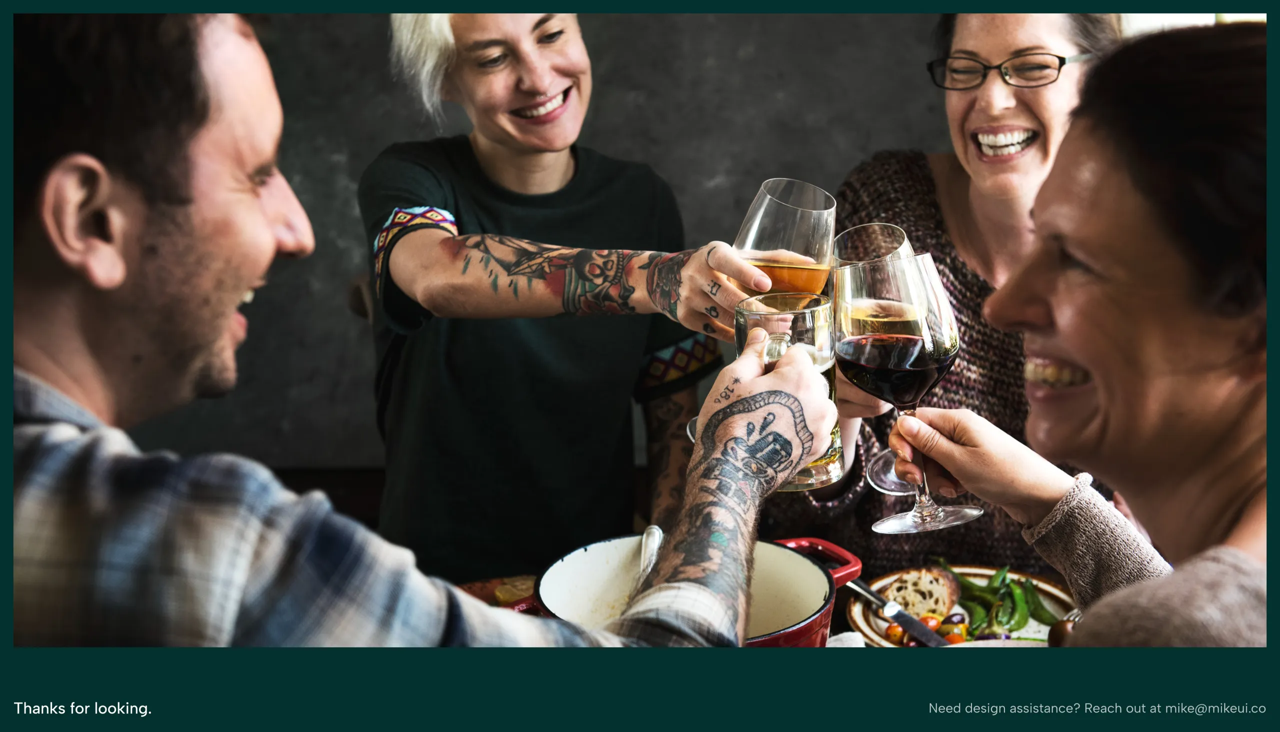 Friends raising glasses of red and white wine over dinner, closing the case study with Mike's contact email