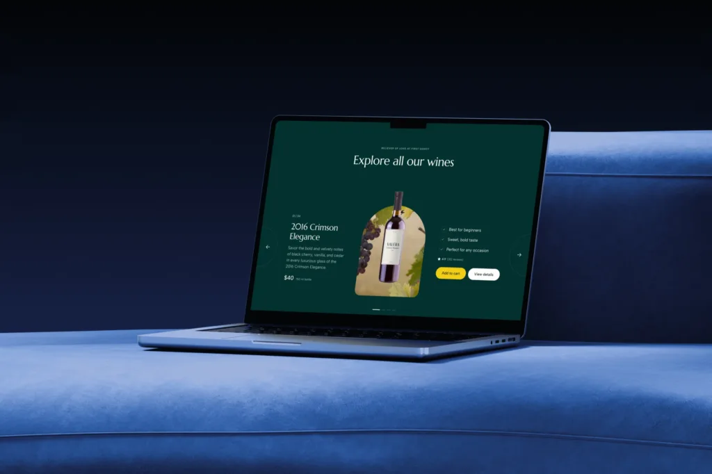 The Valera product slider, Explore all our wines with the 2016 Crimson Elegance, on a MacBook on a deep blue couch